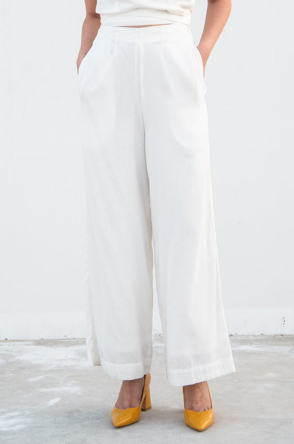 Model wearing a denim high waist pant.