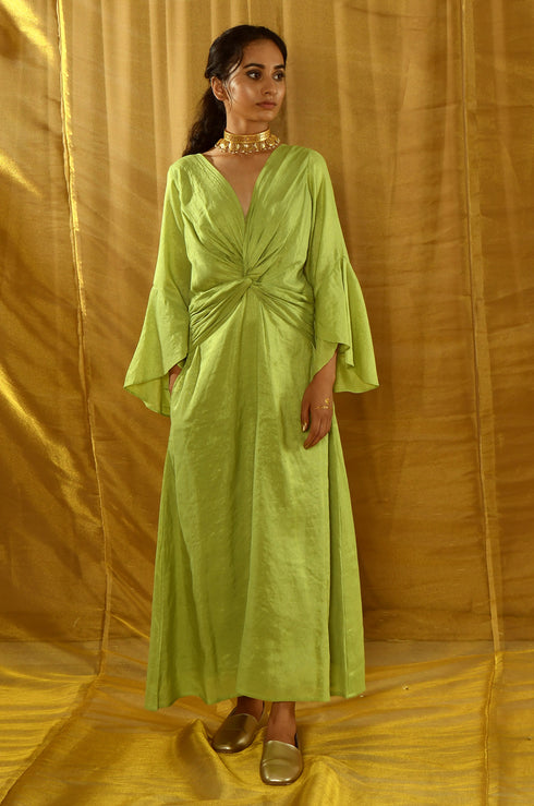 Model posing in a tissue chanderi dress.