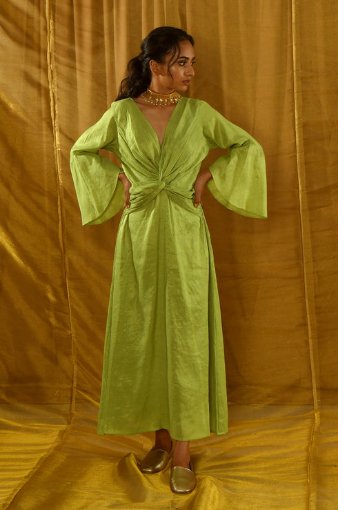 Model posing in a tissue chanderi dress.
