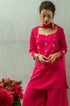 Model posing in women's pink Kurta by Gulaal.